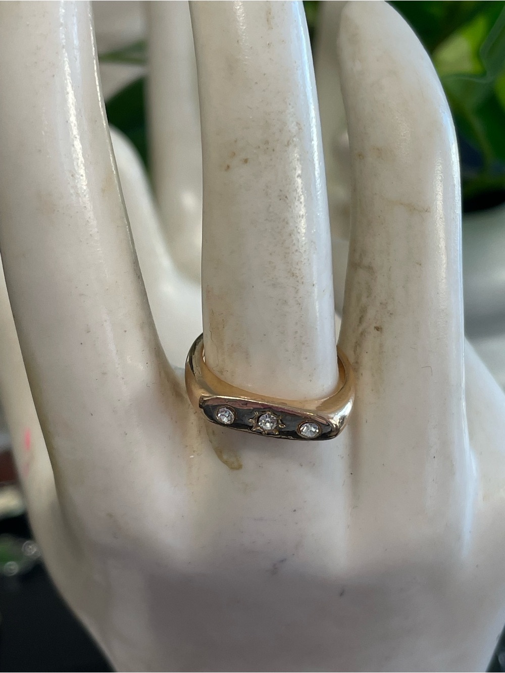 Classic Three-Stone Gold Ring with Clear Stones